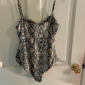 Princes Polly snakeskin bodysuit.